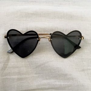 Black and gold heart shape shades